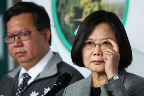 Taiwanese president Tsai Ing-Wen answers the media during a visit to a non woven filter fabric factory, where the fabric is used to make surgical face masks, in Taoyuan, Taiwan, March 30, 2020. REUTERS/Ann Wang