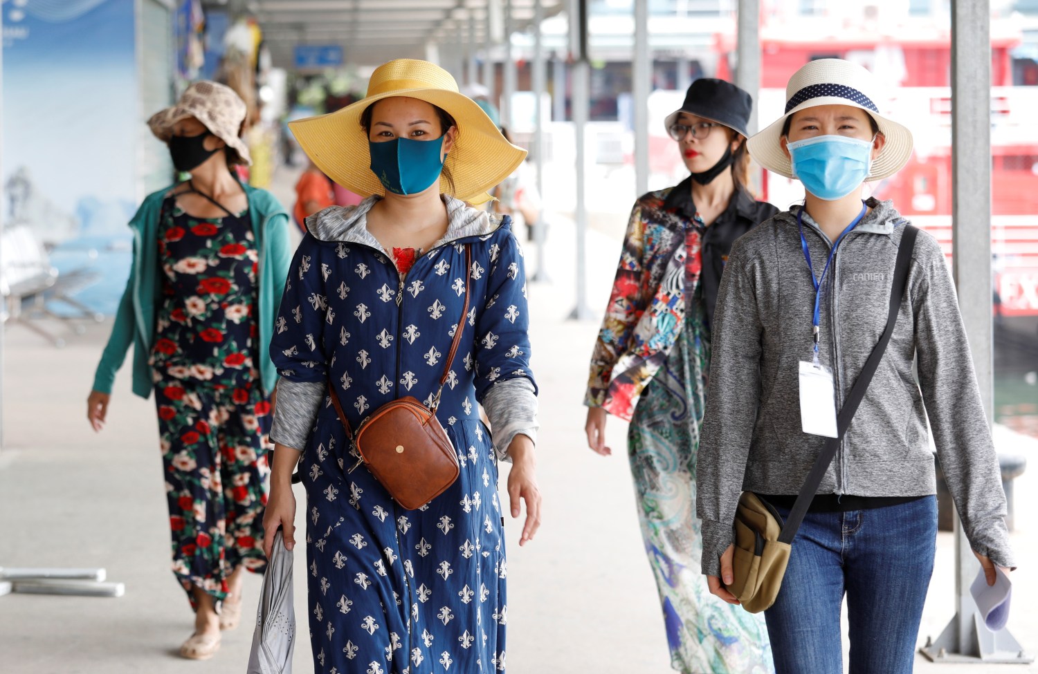 Vietnamese tourists visit Ha Long bay after the Vietnamese government eased the lockdown following the coronavirus disease (COVID-19) outbreak, in Quang Ninh province, Vietnam May 19, 2020. REUTERS/Kham
