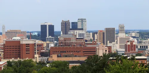 A general view of the city of Birmingham, Alabama, August 9, 2011. Alabama's Jefferson County submitted a second offer to creditors in an attempt to settle its $3.14 billion sewer bond debt, the county commission president said on August 8, 2011. Commissioner David Carrington gave no details of the contents of the latest offer. Jefferson County is struggling to avoid what would be the largest municipal bankruptcy in U.S. History.   REUTERS/Marvin Gentry (UNITED STATES - Tags: BUSINESS)