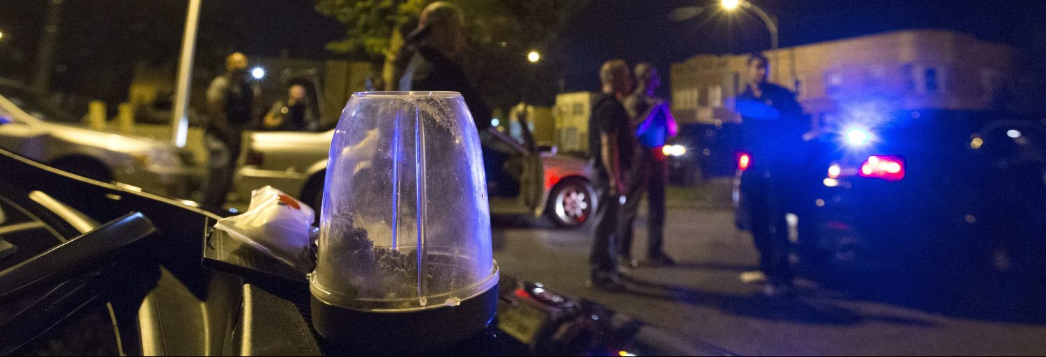 A container of marijuana found during a search of a car by Cook County Sheriff police officers is seen as officers take a man into custody in the Austin neighborhood in Chicago, Illinois, United States, September 10, 2015. The focus on rounding up illegal guns, rather than low-level drug offenders, is an increasing priority for law enforcement in Chicago as murders - almost all of them with firearms and mostly related to gangs - have risen to 304 so far this year, compared with 258 in the same period last year. To match story USA-CRIME/CHICAGO-GUNS  REUTERS/Jim Young