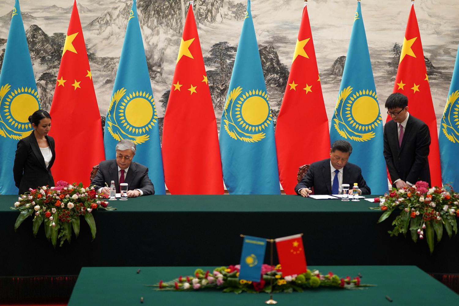 Chinese President Xi Jinping and Kazakh President Kassym-Jomart Tokayev sign documents during the signing ceremony, at the Great Hall of the People, Beijing, China  September 11, 2019 Andrea Verdelli/ Pool via REUTERS   *** Local Caption *** BEIJING, CHINA - SEPTEMBER 11: Kazakh President Kassym Jomart Tokayev talks to Chinese President Xi Jinping (not pictured) during the meeting on September 11, 2019 at the Great Hall of the People, Beijing, China. (Photo by Andrea Verdelli/Pool/Getty Images
