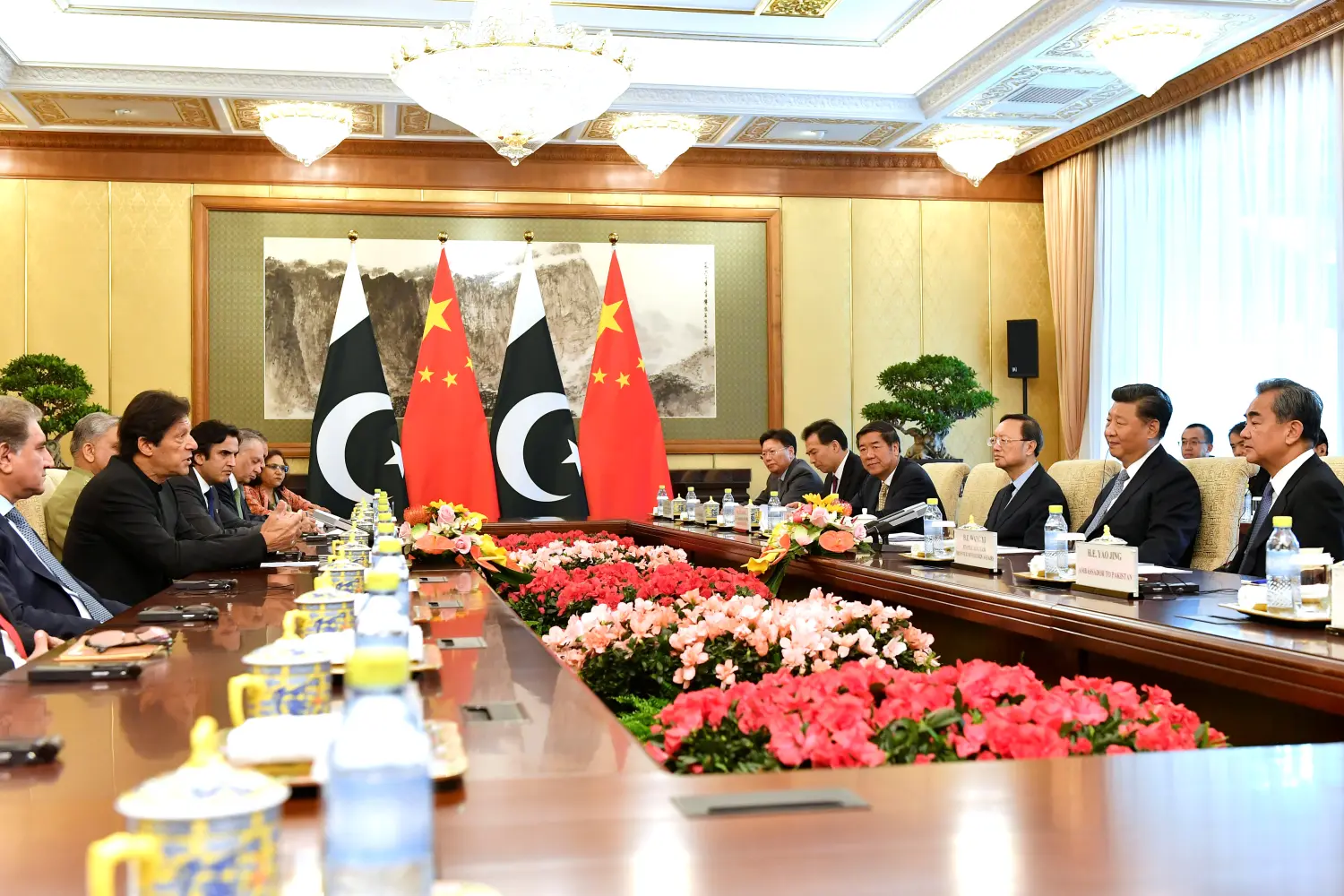 Pakistan's Prime Minister Imran Khan talks to China's President Xi Jinping during their meeting at the Diaoyutai State Guesthouse in Beijing, China, October 9, 2019. Parker Song/Pool via REUTERS