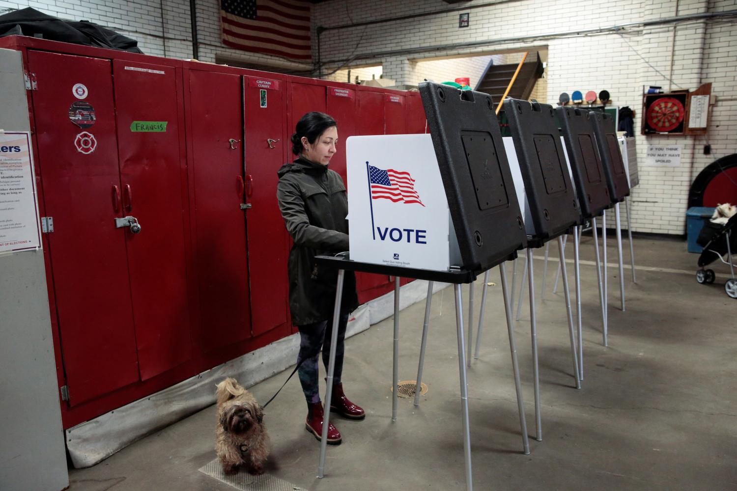 Voters cast their ballots in the Democratic primary election in Detroit, Michigan, U.S., March 10, 2020.  REUTERS/Rebecca Cook