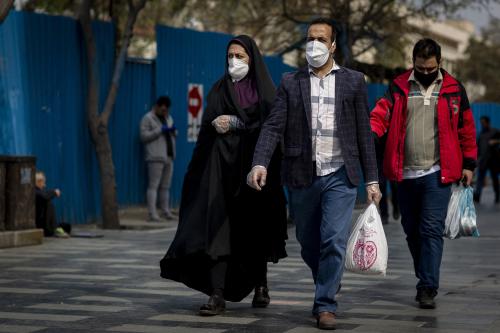 Iranians, some wearing protective masks,walk outside in Tehran, during the Covid-19 coronavirus pandemic crises, on March 17, 2020 in Tehran, Iran. Photo by Ali Shaeigan/Parspix/ABACAPRESS.COM