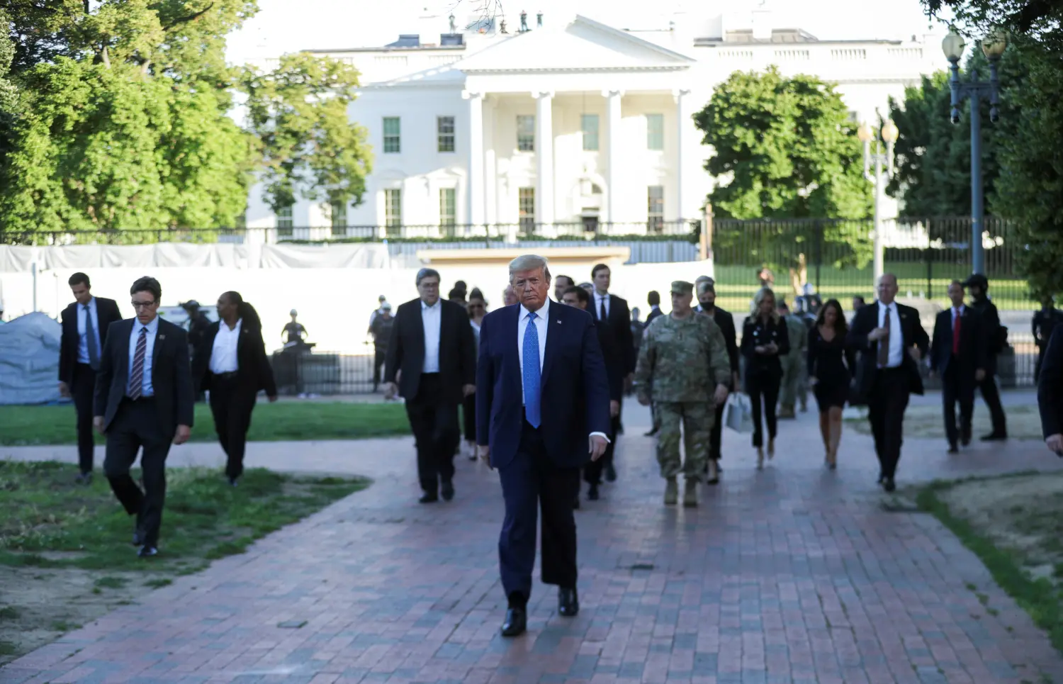 U.S. President Donald Trump walks through Lafayette Park to visit St. John's Episcopal Church across from the White House during ongoing protests over racial inequality in the wake of the death of George Floyd while in Minneapolis police custody, at the White House in Washington, U.S., June 1, 2020. REUTERS/Tom Brenner     TPX IMAGES OF THE DAY