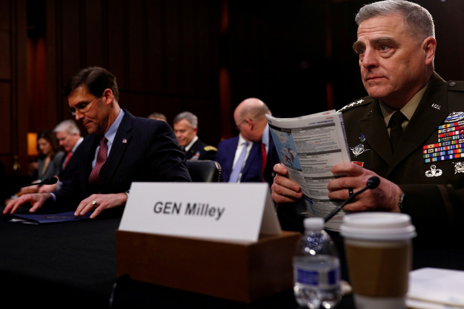 FILE PHOTO: U.S. Chairman of the Joint Chiefs of Staff Gen. Mark A. Milley testifies beside U.S. Defense Secretary Mark Esper before a Senate Armed Services Committee hearing on "Department of Defense Budget Posture" on Capitol Hill in Washington, U.S., March 4, 2020.  REUTERS/Tom Brenner/File Photo