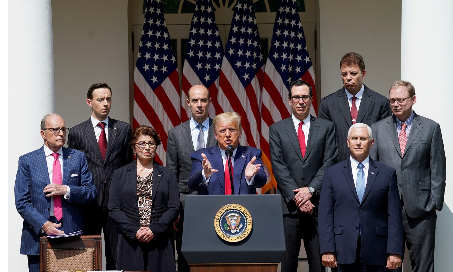 U.S. President Donald Trump talks about a U.S. jobs report amid the coronavirus disease (COVID-19) pandemic as he addresses a news conference as members of his administration listen in the Rose Garden at the White House in Washington, U.S., June 5, 2020. REUTERS/Kevin Lamarque
