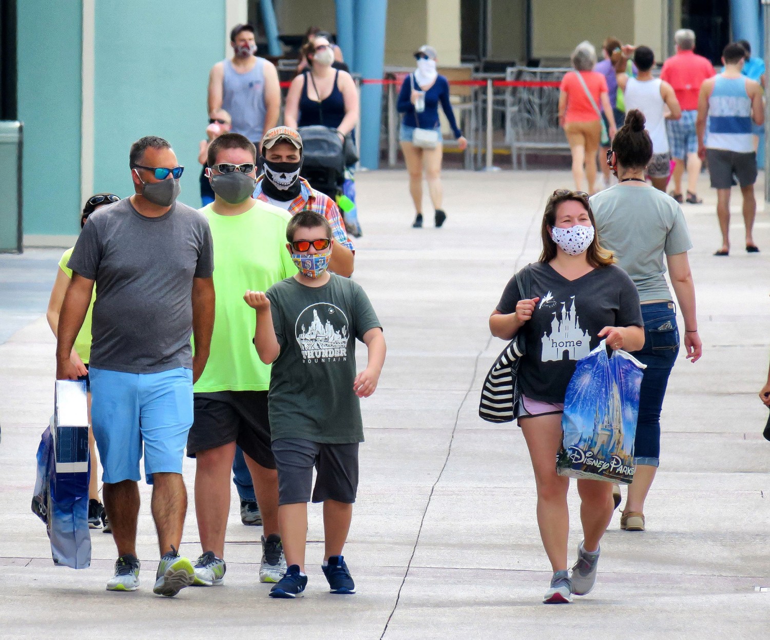Guests wear face masks while visiting the Disney Springs shopping and dining district in Lake Buena Vista, Fla., Wednesday, June 17, 2020. The Florida Department of Health reported 3,207 new cases of Covid-19 on Thursday, marking a record daily high for Florida since the pandemic began. (Joe Burbank/Orlando Sentinel/TNS/ABACAPRESS.COM - NO FILM, NO VIDEO, NO TV, NO DOCUMENTARY)