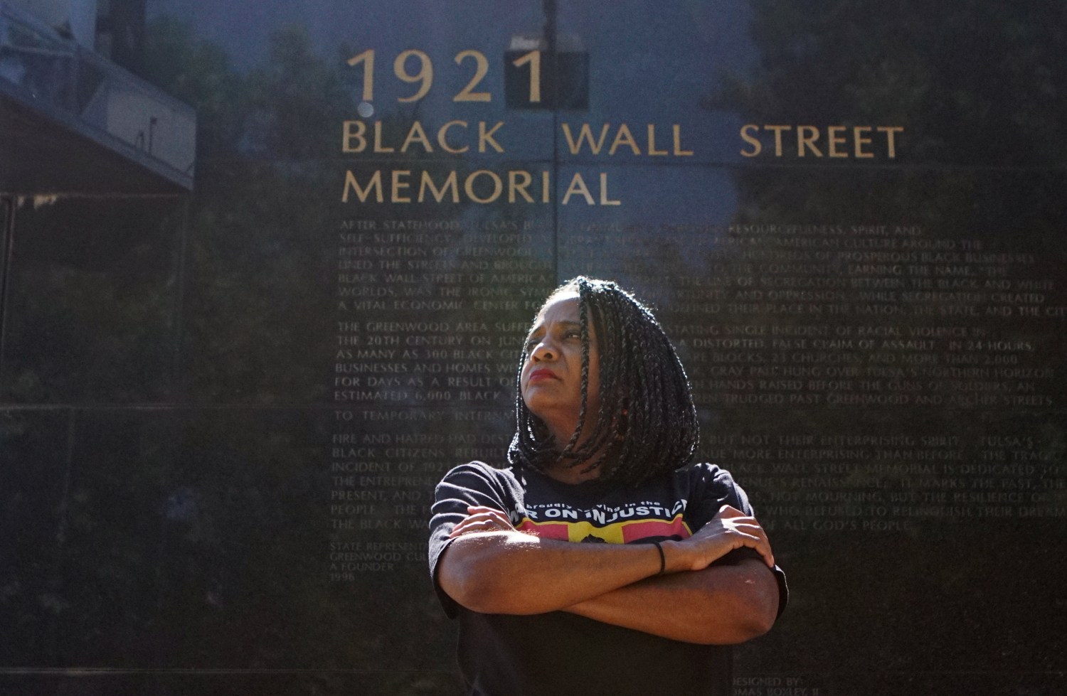Tulsa City Councilor Vanessa Hall-Harper poses for a portrait in front of a monument to the 1921 Black Wall Street massacre in Tulsa, Oklahoma, U.S., June 18, 2020. Picture taken June 18, 2020.  REUTERS/Lawrence Bryant