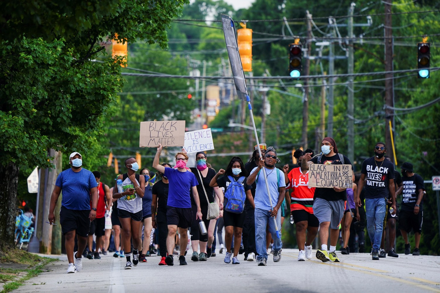People take part in an event to mark Juneteenth, which commemorates the end of slavery in Texas, two years after the 1863 Emancipation Proclamation freed slaves elsewhere in the United States, amid nationwide protests against racial inequality, in Atlanta, Georgia, U.S. June 19, 2020. REUTERS/Elijah Nouvelage