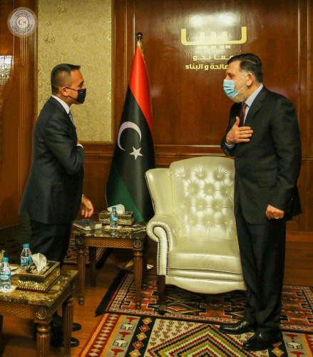 Prime Minister Fayez al-Serraj of Libya's internationally recognised Government of National Accord (GNA) wears a protective mask as he meets with Italian Foreign Minister Luigi Di Maio in Tripoli, Libya June 24, 2020. The Media Office of the Prime Minister/Handout via REUTERS ATTENTION EDITORS - THIS IMAGE WAS PROVIDED BY A THIRD PARTY.