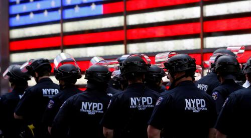 FILE PHOTO: New York Police Department (NYPD) officers are pictured as protesters rally against the death in Minneapolis police custody of George Floyd, in Times Square in the Manhattan borough of New York City, U.S., June 1, 2020. REUTERS/Mike Segar