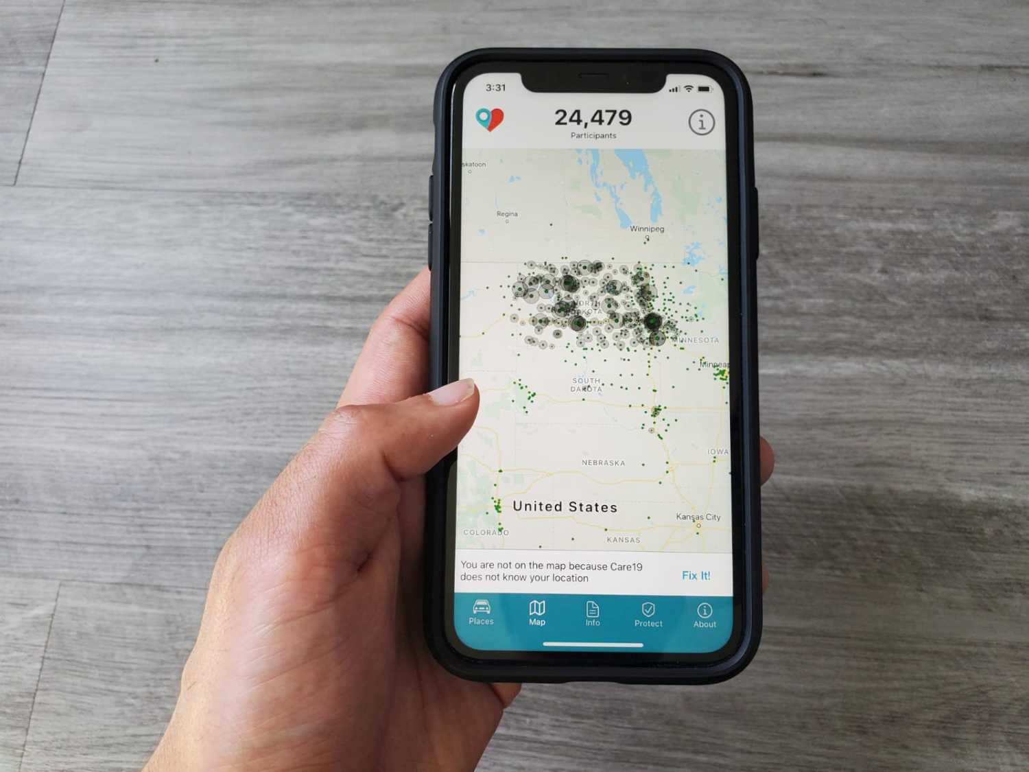 The Care19 mobile app, which the governors of North Dakota and South Dakota have asked residents to download to assist in contact tracing during the global outbreak of the coronavirus disease (COVID-19), is seen on a phone, U.S. April 24, 2020. REUTERS/Paresh Dave