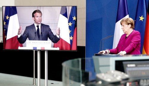 FILE PHOTO: German Chancellor Angela Merkel holds a joint video news conference with French President Emmanuel Macron in Berlin, Germany, May 18, 2020.      Kay Nietfeld/Pool via REUTERS/File Photo