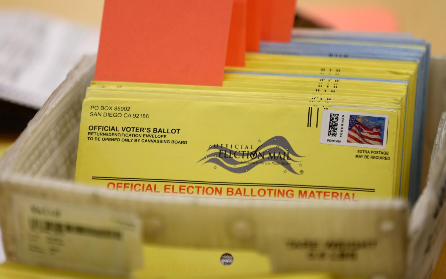 Mail-in ballots wait to be verified at the San Diego County Elections Office in San Diego, California, U.S., November 7, 2016.       REUTERS/Mike Blake