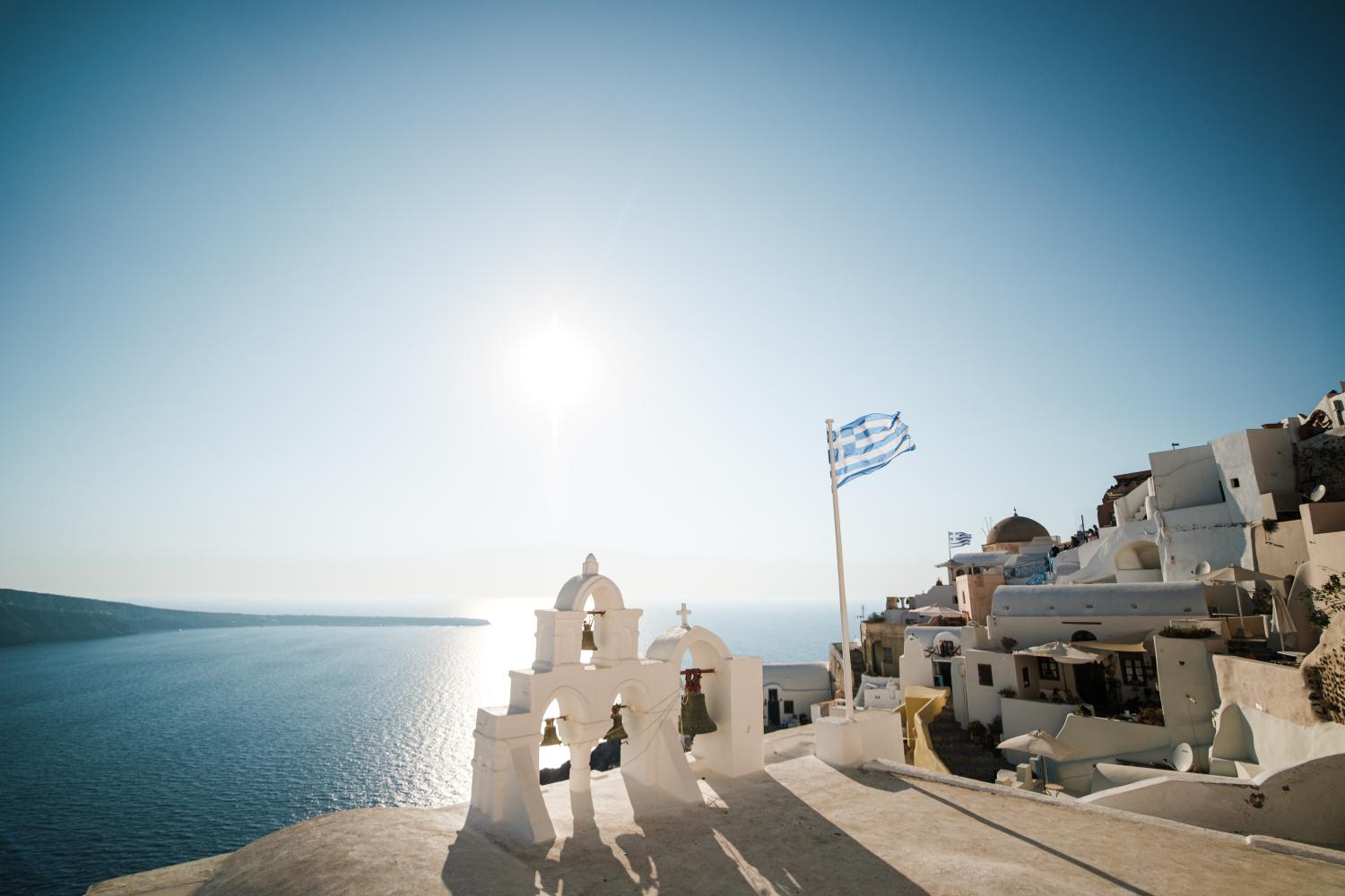 Greek flag on the roof of a church of Santorini. Santorini, Greece, August 17, 2018. Photography by Jean Baptiste Premat / Hans Lucas.Drapeau Grecque sur le toit d une eglise de Santorin. Santorin, Grece, 17 Aout 2018. Photographie de Jean Baptiste Premat / Hans Lucas.NO USE FRANCE