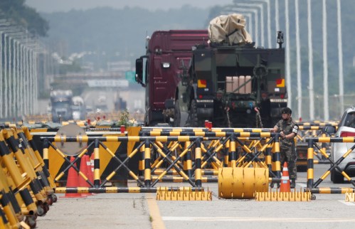 A soldier stands guard at a checkpoint on the Grand Unification Bridge which leads to the inter-Korean Kaesong Industrial Complex in North Korea, just south of the demilitarized zone separating the two Koreas, in Paju, South Korea, June 17, 2020. REUTERS/Kim Hong-Ji - RC2RAH9I02ID