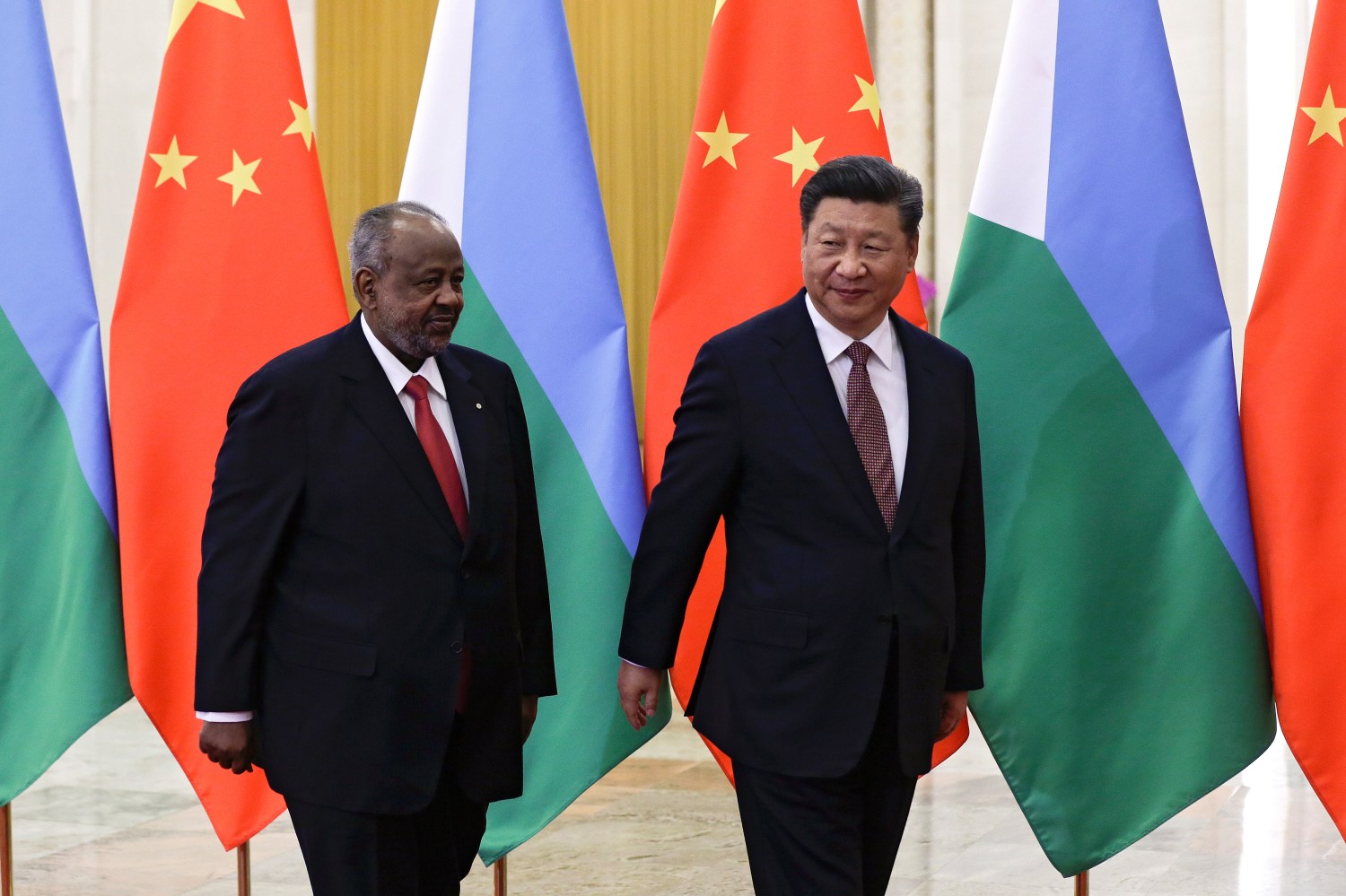 Djibouti's President Ismail Omar Guelleh and China's President Xi Jinping walk to their bilateral meeting at the Great Hall of the People in Beijing, China September 2, 2018. Andy Wong/Pool via REUTERS   *** Local Caption *** Abdel Fattah al-Sisi;Li Keqiang