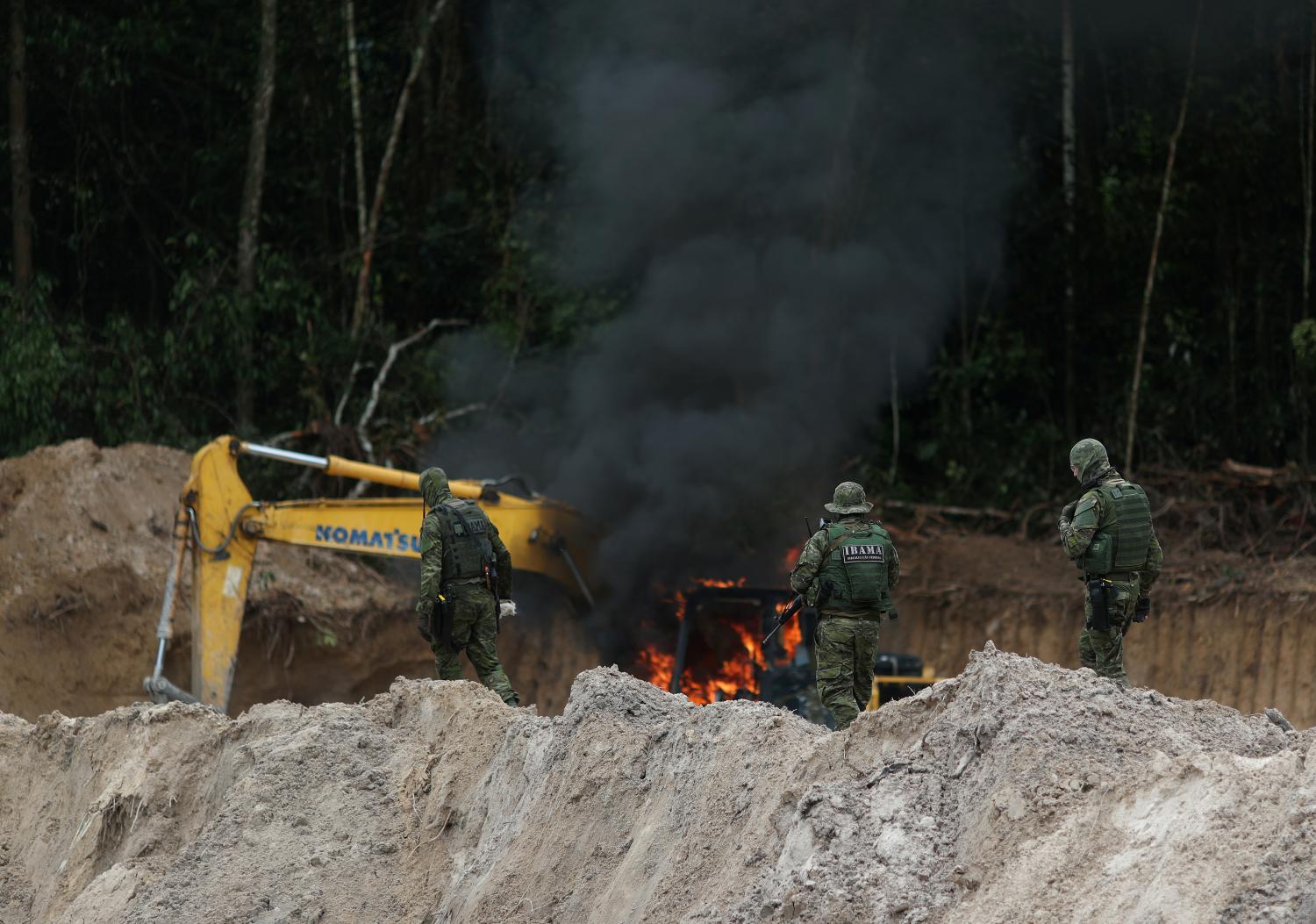 Machines are destroyed at an illegal gold mine during an operation conducted by agents of the Brazilian Institute for the Environment and Renewable Natural Resources, or Ibama, in national parks near Novo Progresso, southeast of Para state, Brazil, November 5, 2018. REUTERS/Ricardo Moraes