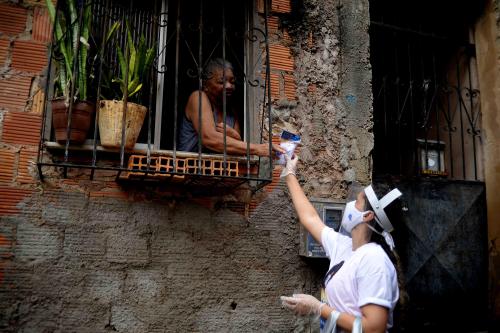 EL SALVADOR, BRAZIL-The local government continues to distribute free masks in the communities of Salvador, Brazil on May 28, 2020. Brazilian authorities recorded 418,608 cases of Covid-19, 25,935 deaths and 190,845 recovered in the country.