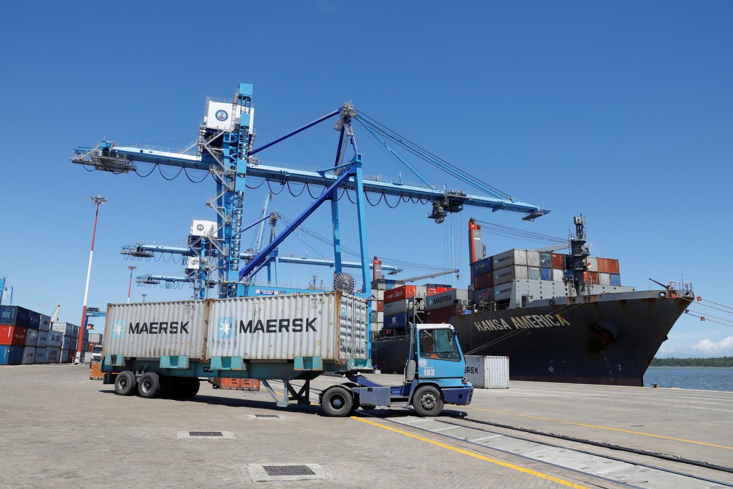 Containers are seen being transported on a container ship as it is docked in the port of Mombasa, Kenya, October 23, 2019. Picture taken October 23, 2019. REUTERS/Baz Ratner