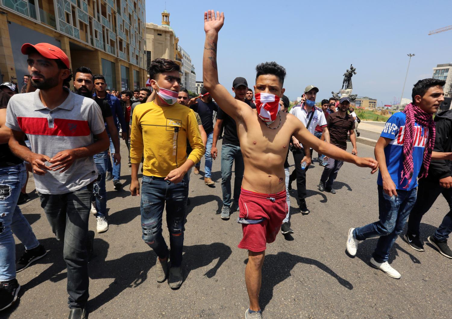 A demonstrator gestures during a protest against the government performance and worsening economic conditions, in Beirut, Lebanon June 6, 2020. REUTERS/Aziz Taher