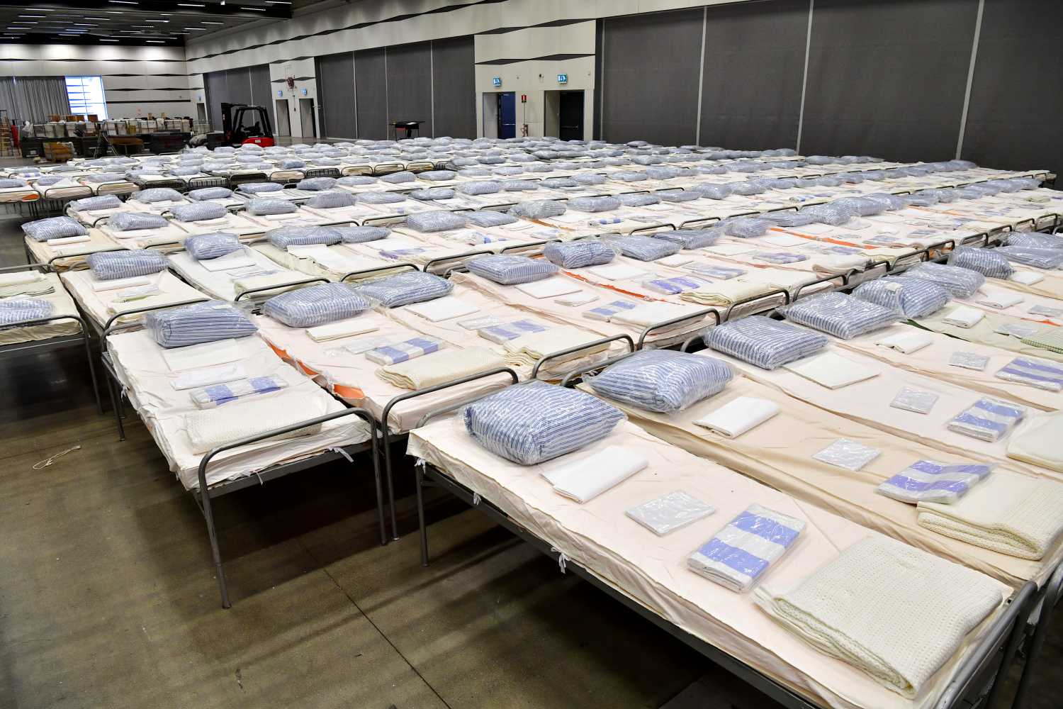 Beds are seen in a field hospital which will provide extra intensive care space for patients with coronavirus disease (COVID-19), inside the exhibition centre Stockholmsmassan in Alvsjo, Stockholm, Sweden March 30, 2020. Jonas Ekstromer/TT News Agency via REUTERS      ATTENTION EDITORS - THIS IMAGE WAS PROVIDED BY A THIRD PARTY. SWEDEN OUT. NO COMMERCIAL OR EDITORIAL SALES IN SWEDEN.
