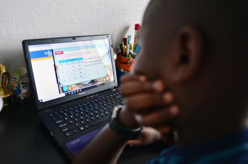 9 year old student Jordan in his bedroom in front of his laptops during distance virtual school learning amid Coronavirus Pandemic in Broward County, Florida Public Schools. Florida began their experience with online virtual distance learning, amid the growing coronavirus pandemic on March 31, 2020 in Miramar, Florida.   (Photo by JL/Sipa USA)No Use UK. No Use Germany.