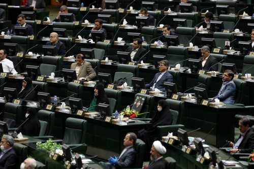 Iranian lawmakers attend the opening ceremony of Iran's 11th parliament, practicing social distancing as the spread of the coronavirus disease (COVID-19) continues, in Tehran, Iran, May 27, 2020. WANA (West Asia News Agency) via REUTERS ATTENTION EDITORS - THIS PICTURE WAS PROVIDED BY A THIRD PARTY