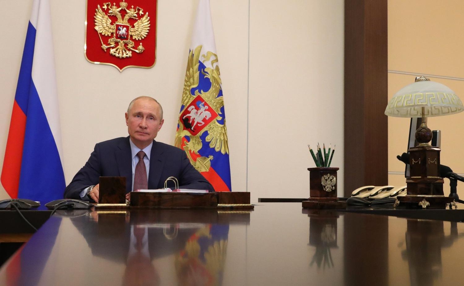 MOSCOW, RUSSIA- President Vladimir Putin held a video conference meeting with participants of the national campaign "We Are Together" in Moscow, Russia on June 26, 2020. "The coronavirus epidemic in Russia is on the decline", Putin declared this Friday (26). "Now, thanks to God, the epidemic is receding, and the volume of tasks that volunteers must complete begins to decrease little by little," said the Russian leader during a meeting with the participants of the "We Are Together" initiative that covered the entire territory of the country. The president stressed that the Russian volunteers "carried out their work successfully" and also announced that the NGOs that help people in precarious situations managed to raise some 1,800 million rubles (almost 25.9 million dollars) for people affected by the pandemic.