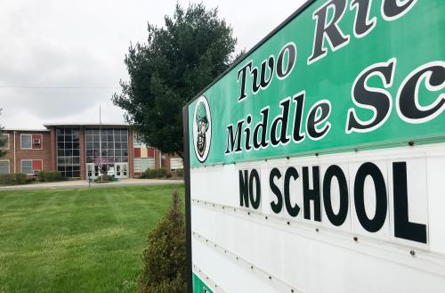Schools have been closed and Two Rivers Middle has a sign saying so as the coronavirus outbreak continued to force many people indoors in Nashville, Tenn. Saturday, March 28, 2020.Empty 04