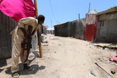 A Somali soldier holds position as al-Shabaab militia storms a government building in Mogadishu, Somalia March 23, 2019. REUTERS/Feisal Omar