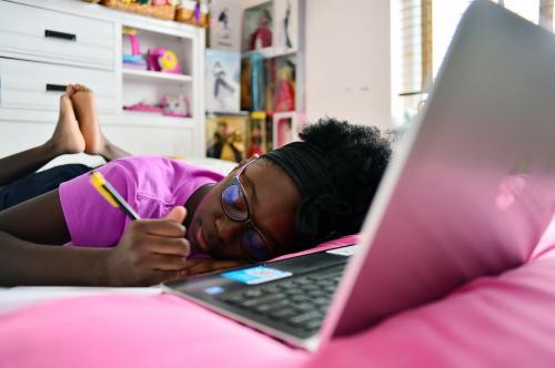 13th year old student Jayen in her bedroom in front of her laptops during distance virtual school learning amid Coronavirus Pandemic in Broward County, Florida Public Schools. Florida began their experience with online virtual distance learning, amid the growing coronavirus pandemic on March 31, 2020 in Miramar, Florida.   (Photo by JL/Sipa USA)No Use UK. No Use Germany.
