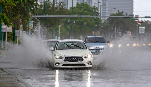 Cars go through the flood caused by heavy rains on Biscayne Boulevard in Aventura on May 24, 2020, in Sunny Isles Beach, Fla. (Photo by David Santiago/Miami Herald/TNS/Sipa USA)No Use UK. No Use Germany.