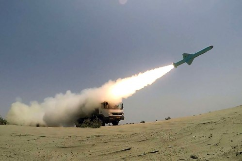 A missile being fired out to sea from a mobile launch vehicle reportedly on the southern coast of Iran along the Gulf of Oman during a military exercise. Iran test-fired a "new generation" of cruise missiles on June 18, the navy said, in the first such military exercises since 19 sailors were killed last month in a friendly fire incident. The armed forces' website published pictures of the exercises in the Gulf of Oman showing missiles being fired from a warship and the back of a truck, and a vessel exploding out at sea. A statement said both short- and long-range missiles were test-fired, some reportedly hitting targets at a distance 280 kilometres (174 miles) away. Gulf of Oman, Iran, June 18, 2020. Photo by SalamPix/ABACAPRESS.COM