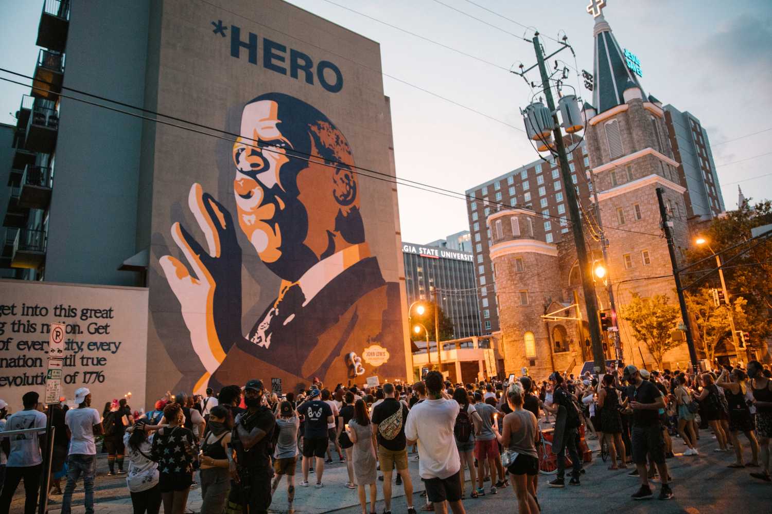 Mourners of the late Rep. John Lewis, a pioneer of the civil rights movement and long-time member of the U.S. House of Representatives, hold a vigil in his memory in Atlanta, U.S. July 19, 2020. REUTERS/Lynsey Weatherspoon
