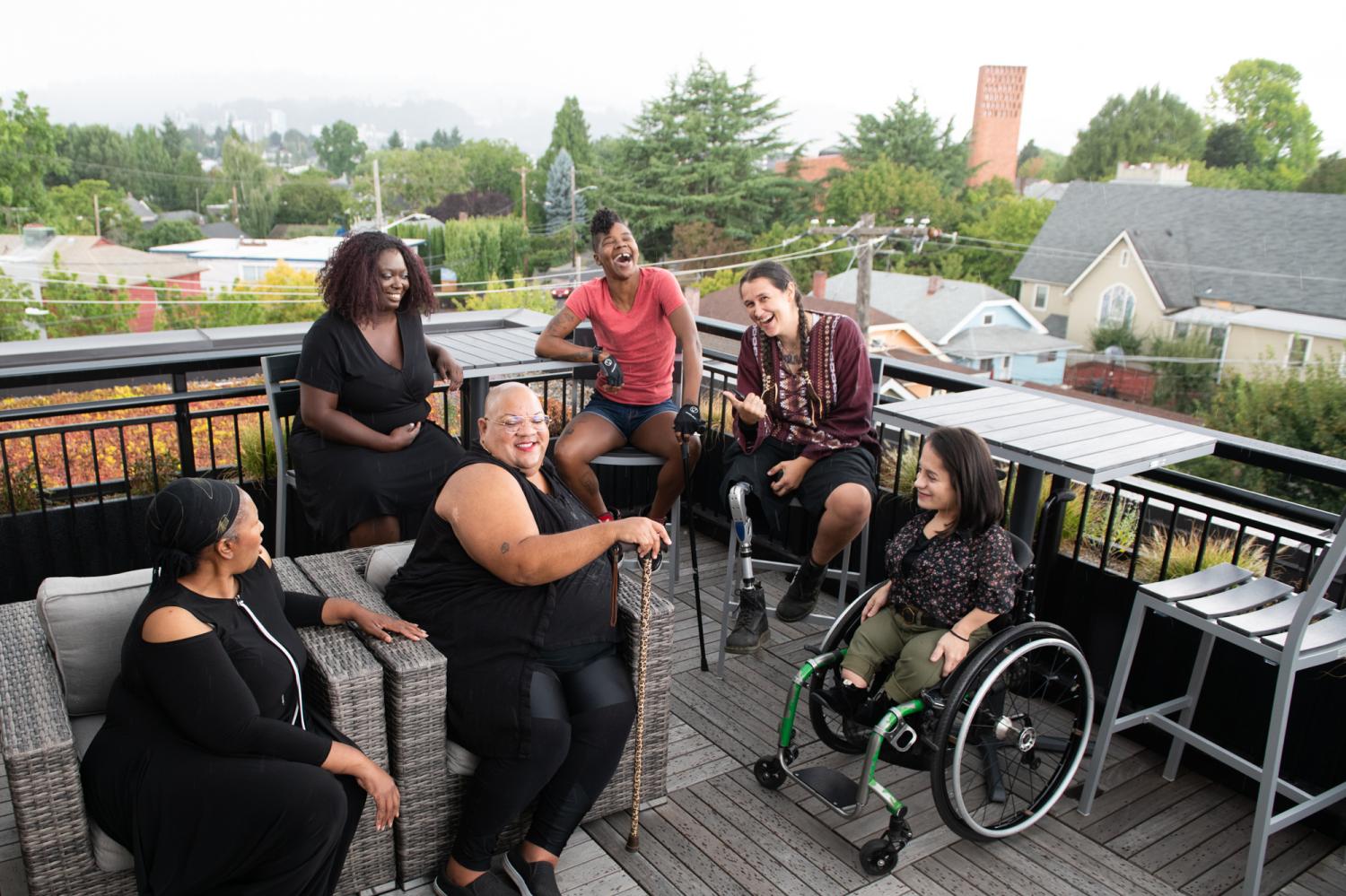 Disabled women talk together