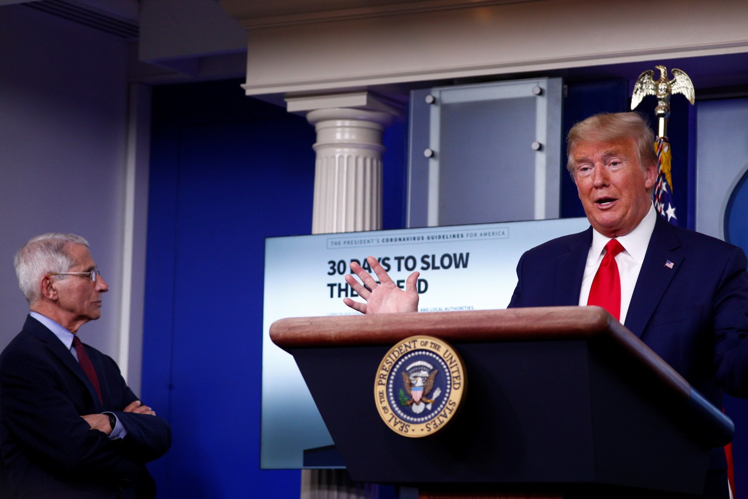 Dr. Anthony Fauci, Director of the National Institute of Allergy and Infectious Diseases, listens as U.S. President Donald Trump addressses the daily coronavirus response briefing at the White House in Washington, U.S., March 31, 2020. REUTERS/Tom Brenner?