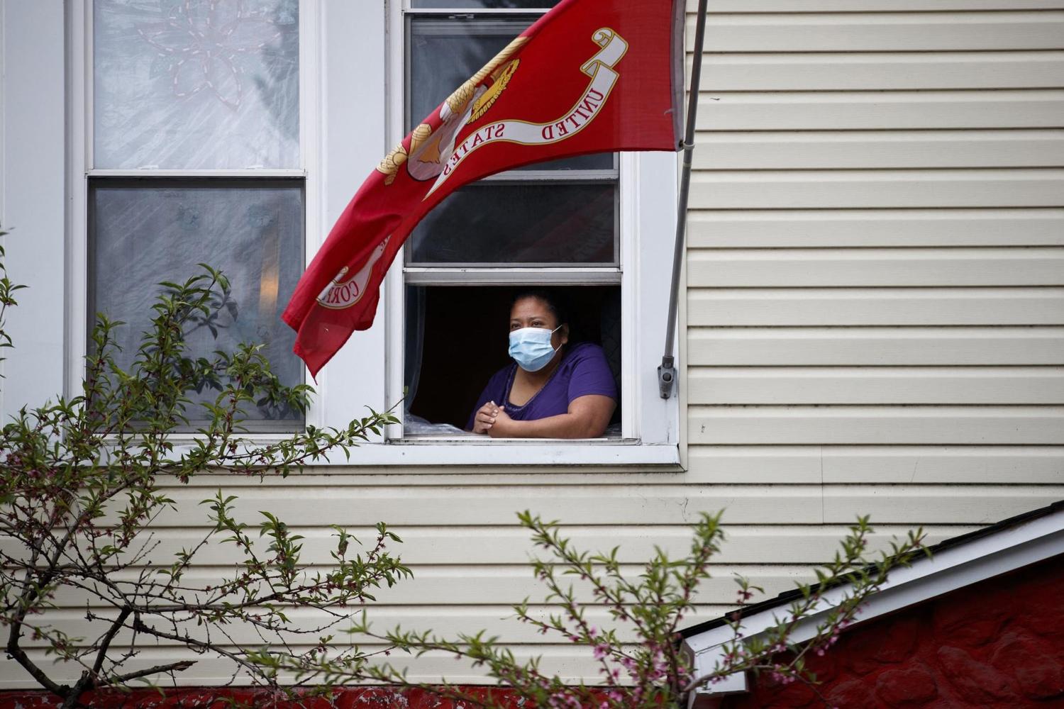 Maria Ochoa, 50, poses for a portrait inside her home Tuesday, May 5, 2020 in Chicago. Ochoa, her husband and daughter have been sick with COVID-19 for two weeks. She believes her family contracted the virus from her husband's meat packing job in the Back of the Yards neighborhood. (Armando L. Sanchez/Chicago Tribune/TNS)