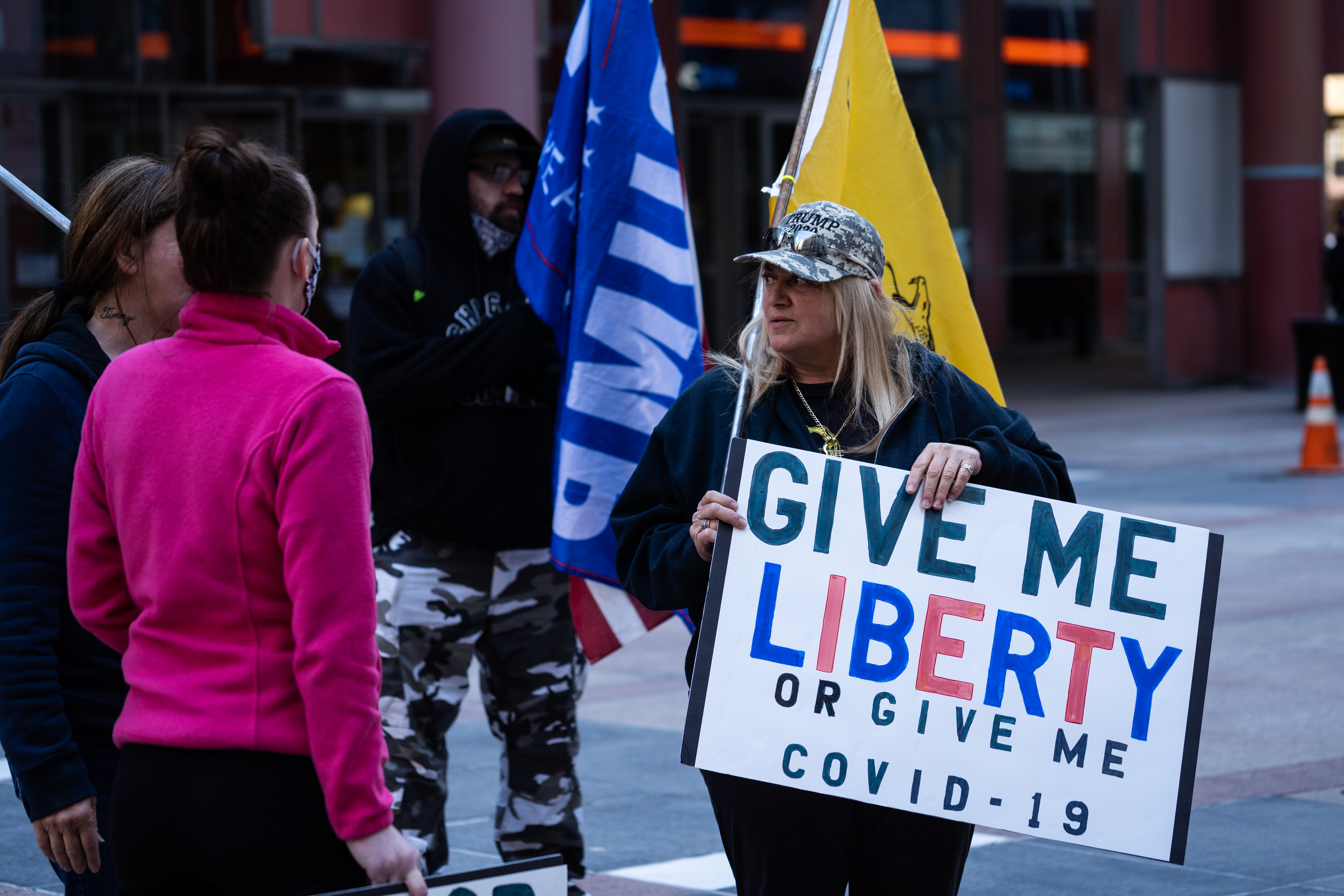 A Donald Trump supporter protests the extension of the stay-at-home order outside the Thompson Center in Chicago on May 1, 2020. The modified stay-at-home order by Illinois Governor J.B. Pritzker runs through the end of May to slow the spread of COVID-19 and now requires people to wear a face covering when entering businesses or when social distancing in public places is not possible. (Photo by Max Herman/Sipa USA)No Use UK. No Use Germany.