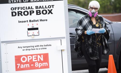 UNITED STATES - APRIL 28: A voter casts a ballot at a drop box for either Democrat Kweisi Mfume or Republican Kimberly Klacik in the election to fill the remainder of the late Rep. Elijah CummingsÕ term near Edmondson High School in Baltimore, Md., on Tuesday, April 28, 2020. (Photo By Tom Williams/CQ Roll Call/Sipa USA)No Use UK. No Use Germany.