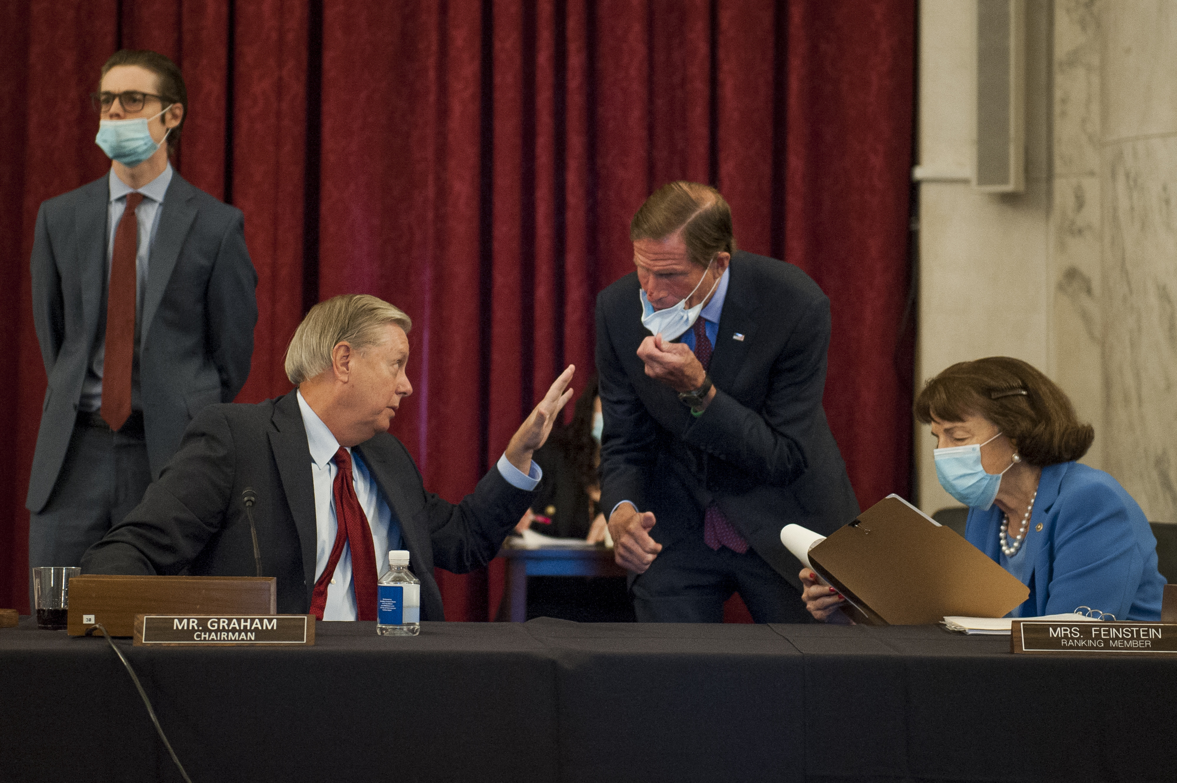 United States Senator Lindsey Graham (Republican of South Carolina), Chairman, US Senate Judiciary Committee, left, US Senator Richard Blumenthal (Democrat of Connecticut), center, and US Senator Dianne Feinstein (Democrat of California), Ranking Member, US Senate Judiciary Committee, right, chat prior to the committee markup of the "Eliminating Abusive and Rampant Neglect of Interactive Technologies (EARN IT) Act of 2020," and judicial nominations in Russell Senate Office Building on Capitol Hill in Washington, DC, USA, Thursday, July 2, 2020. Photo by Rod Lamkey/CNP/ABACAPRESS.COM