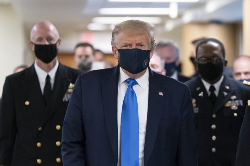 Photo dated July 11, 2020 of United States President Donald Trump arrives at Walter Reed National Military Medical Center to visit with wounded military members and front line coronavirus healthcare workers in Bethesda, MD, USA. US President Donald Trump has worn a mask in public for the first time since the start of the coronavirus pandemic. The president was visiting the Walter Reed military hospital outside Washington, where he met wounded soldiers and health care workers. "I've never been against masks but I do believe they have a time and a place," he said as he left the White House. He has previously said that he would not wear a mask and mocked Democratic rival Joe Biden for doing so. Photo by Chris Kleponis/Pool/ABACAPRESS.COM