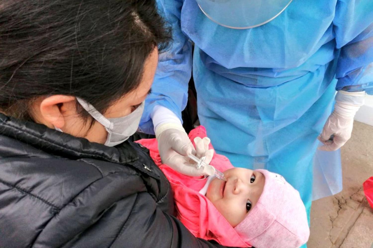 LOS OLIVOS, PERU- In the photos taken on July 10, 2020, teams from the Ministry of Health provide comprehensive health care to more than 300 children, pregnant women and older adults, prioritizing the regular vaccination scheme in Los Olivos, Peru.