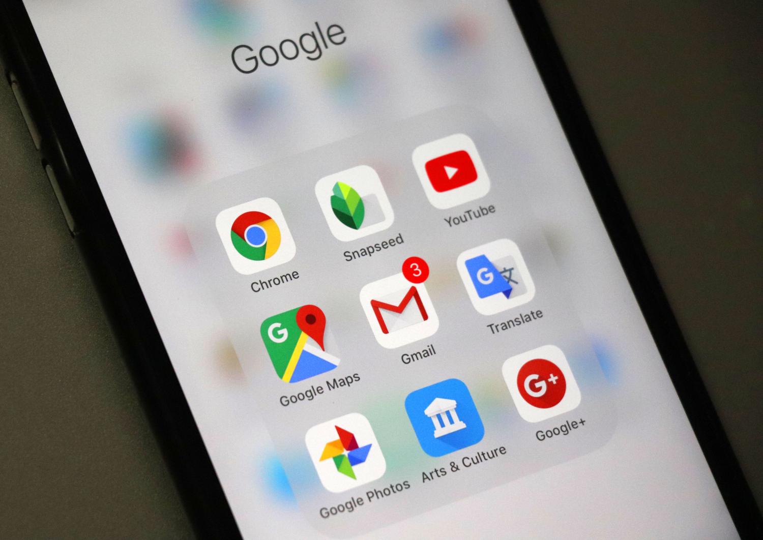 A mobile phone user looks at the icons of the mobile apps of Alphabet Inc's Google on his smartphone in Beijing, China, 16 January 2018.Alphabet Inc's Google said on Tuesday (16 January 2018) it has made "no changes" to its mapping platform in China, denying an earlier media report that claimed it was re-launching the function in China, where many of its services are blocked. Japan's Nikkei reported earlier that Google had set up a China-specific version of the Google Maps website for the first time in eight years and introduced a map application for Chinese iPhones for the first time. Google, however, stated that the Google Maps browser has been available in China for many years while there is no Maps application offered in the country.No Use China. No Use France.