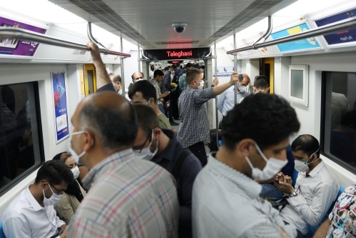 Iranians wearing protective face masks ride the metro, following the outbreak of the coronavirus disease (COVID-19), in Tehran, Iran, June 28, 2020. WANA (West Asia News Agency) via REUTERS ATTENTION EDITORS - THIS PICTURE WAS PROVIDED BY A THIRD PARTY