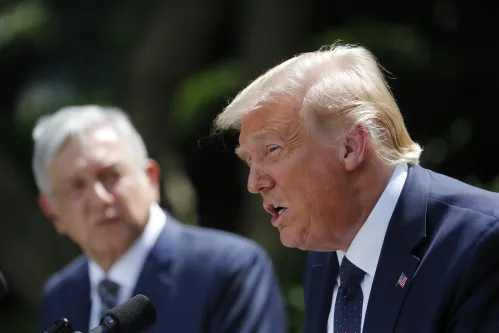 U.S. President Donald Trump speaks as Andres Manuel Lopez Obrador, Mexico's president, left, listens during a signing ceremony in the Rose Garden of the White House in Washington, D.C., U.S., on Wednesday, July 8, 2020. Lopez Obrador has carefully built a rapport with Trump, even as the president lambasted Mexico for its drug cartels and crime rates, for migration flows into the U.S. and for allegedly taking advantage of America on trade. Photographer: Al Drago/Pool/Sipa USANo Use UK. No Use Germany.