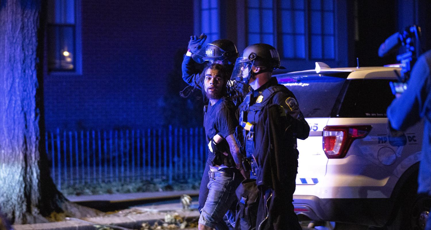 A demonstrator is moved by police during a protest in Washington, D.C., U.S., on Monday, June 1, 2020, following the death of an unarmed black man at the hands of Minnesota police on May 25, 2020. More than 200 active duty military police were deployed to Washington D.C. following three days of protests. Photo by Stefani Reynolds / CNP/ABACAPRESS.COM