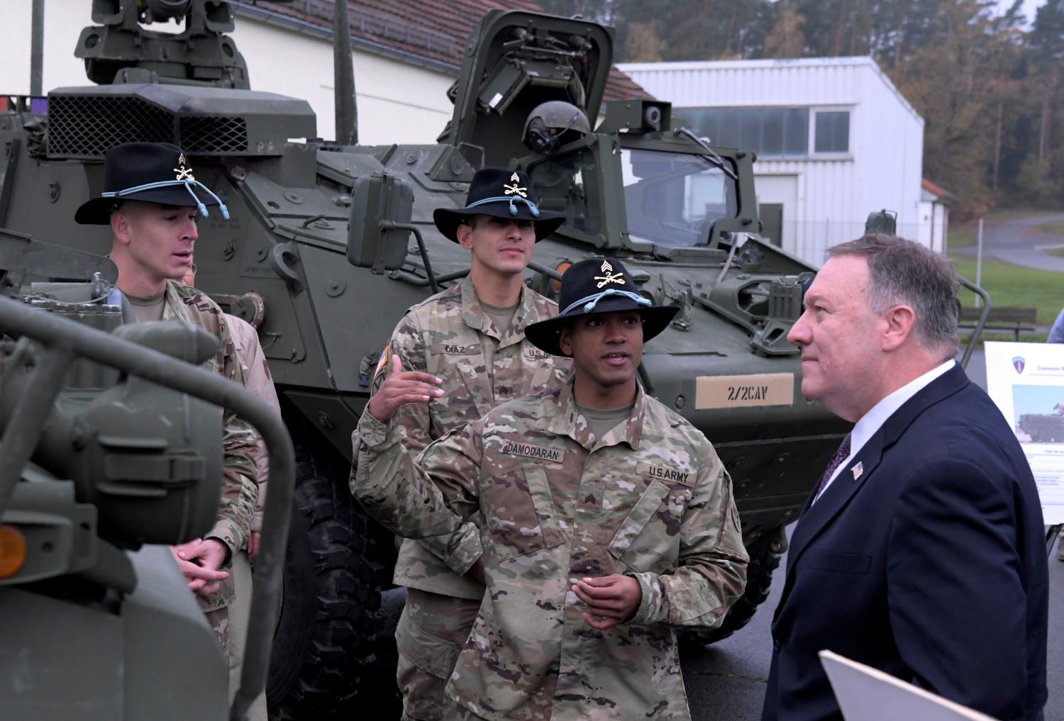 FILE PHOTO: U.S. Secretary of State Mike Pompeo speaks with U.S. soldiers based in Grafenwoehr, Germany November 7, 2019.  Jens Meyer/Pool via REUTERS/File Photo