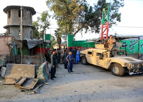 Afghan security forces inspect the site of an attack on a jail compound in Jalalabad, Afghanistan August 3, 2020.REUTERS/Parwiz